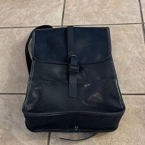 Stylish Black unisex RAINS backpack medium-small size